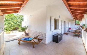 Amazing home in Okrug Gornji with WiFi and 4 Bedrooms